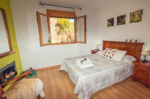 Postel nebo postele na pokoji v ubytování Casas en Omañuela by Villamya