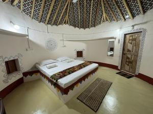 Ένα ή περισσότερα κρεβάτια σε δωμάτιο στο Rann Sanji Stay