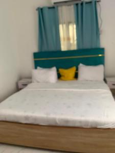 Ένα ή περισσότερα κρεβάτια σε δωμάτιο στο Vivi apartment hotel and suite +9 φωτογραφίες