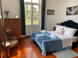 Ένα ή περισσότερα κρεβάτια σε δωμάτιο στο Calvocoressi Estate +44 φωτογραφίες