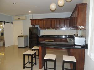 Kuchyň nebo kuchyňský kout v ubytování The Trend Villa