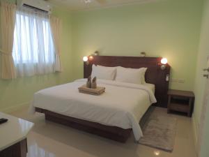 Postel nebo postele na pokoji v ubytování The Trend Villa + 51 fotografií