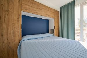 Postel nebo postele na pokoji v ubytování Camping Village Bocca di Cecina + 121 fotografií