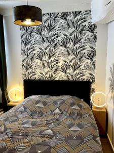 Postel nebo postele na pokoji v ubytování Magnifique T2 coeur de ville Port a pieds