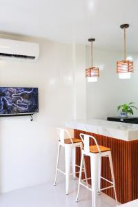 Μια τηλεόραση ή/και κέντρο ψυχαγωγίας στο Felicitas Extension Room