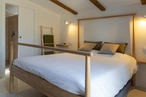 Postel nebo postele na pokoji v ubytování Casa Muela - Holiday house, perfect for two! + 22 fotografií