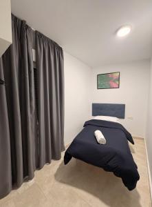 Postel nebo postele na pokoji v ubytování Chillout 10, Granada centro