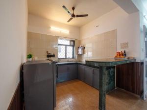 Η κουζίνα ή μικρή κουζίνα στο Mountain Mist Villa by Palette Homes 2BHK l Jacuzzi l Pool l Lonavala