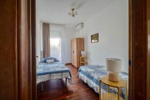 Кровать или кровати в номере Villa Roberta Lucca Centro +51 фотография