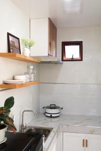 Η κουζίνα ή μικρή κουζίνα στο Felicitas Extension Room