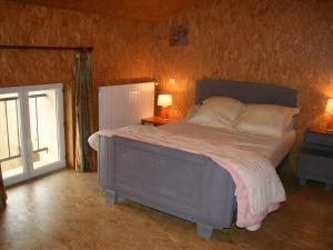 Ένα ή περισσότερα κρεβάτια σε δωμάτιο στο Moulin Du Cher