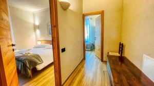 Ένα ή περισσότερα κρεβάτια σε δωμάτιο στο Casa Pozzallo Vetreria - Affitti Brevi Italia