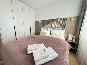 Postel nebo postele na pokoji v ubytování Cozy LOFT Suites & Urban Retreats