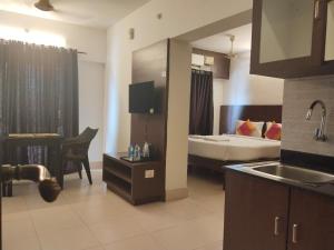 Galería fotográfica de Pratham Inn by Downtown Hotels en Manipala