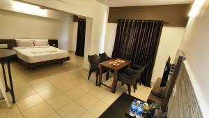 Galería fotográfica de Pratham Inn by Downtown Hotels en Manipala 8 fotos más