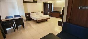 Galería fotográfica de Pratham Inn by Downtown Hotels en Manipala