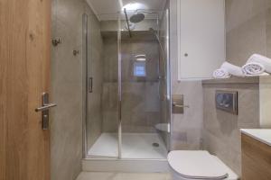 Koupelna v ubytování Résidence le 16 - Centre Ville