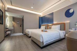 Φωτογραφία από το άλμπουμ του OKDAY Hotel Hengyang Nanhua University Jiefang Xi Road στο Χενγκγιάνγκ