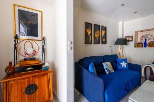 Χώρος καθιστικού στο Cozy appartment Roissy CDG-Paris -Asterix-ParcExp