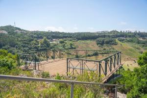 a wooden walkway on top of a hill at 1/4 na Serra in Rio Maior