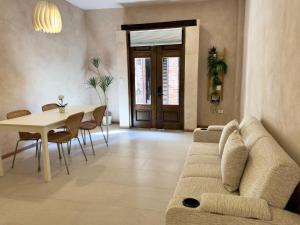 Posezení v ubytování Loft Mueganos III en Val´Quirico