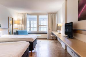 Телевізор і / або розважальний центр в Scandic Mikkeli