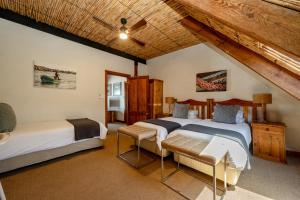 Ένα ή περισσότερα κρεβάτια σε δωμάτιο στο The Farmhouse Hotel +69 φωτογραφίες