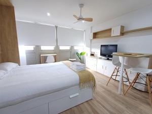 Η κουζίνα ή μικρή κουζίνα στο Precioso loft para disfrutar de Ourense