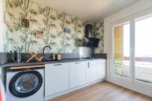 Η κουζίνα ή μικρή κουζίνα στο Spacieux appartement vue sur mer - Saint-Brieuc +9 φωτογραφίες