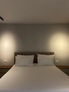 Postel nebo postele na pokoji v ubytování Vila 11