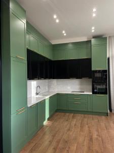 Kuchyň nebo kuchyňský kout v ubytování Vila 11