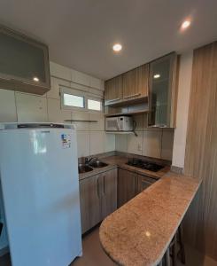 Køkken eller tekøkken på Ponta Negra Flat - Melon Flat