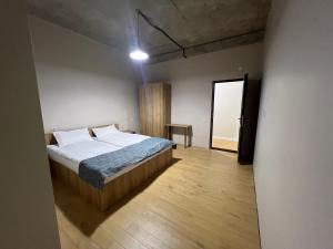 Postel nebo postele na pokoji v ubytování Park Side Hotel Tsalka