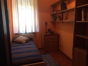 Giường trong phòng chung tại Rifugio tra mare e montagna