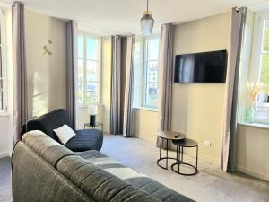 Et tv og/eller underholdning på Mage hôtels - HÔTEL LA GRENETTE