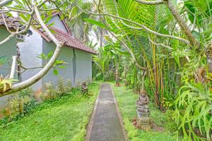 Κήπος έξω από το OYO 94782 Loka Loka Ubud