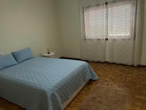 Postel nebo postele na pokoji v ubytování Large apartment near Porto- Paços de Ferreira