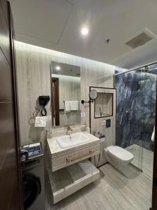 Ванная комната в شقق مفروشة هداج تاون العلا