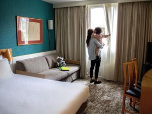 Postel nebo postele na pokoji v ubytování Hotel Novotel Evry Courcouronnes