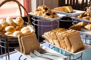 a display of bread and pastries on trays at Castle Inn in Newtownstewart