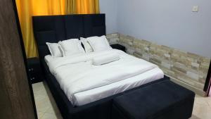 Postel nebo postele na pokoji v ubytování The cozy apartments