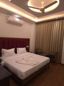 Postel nebo postele na pokoji v ubytování PD Residency