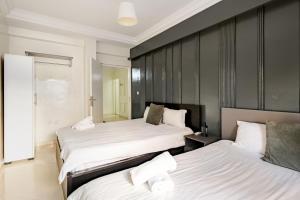 Ένα ή περισσότερα κρεβάτια σε δωμάτιο στο Authentic & Spacious 2 Bedrooms Heart of Rabat