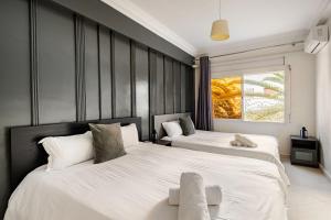 Ένα ή περισσότερα κρεβάτια σε δωμάτιο στο Authentic & Spacious 2 Bedrooms Heart of Rabat +14 φωτογραφίες