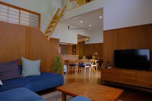 Televiisor ja/või meelelahutuskeskus majutusasutuses ワタリグラスハウス