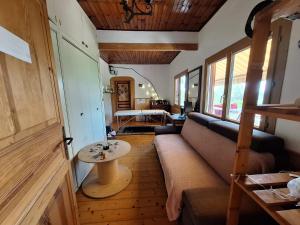 Χώρος καθιστικού στο Le Cottage De Zénitude +11 φωτογραφίες