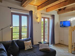 TV a/nebo společenská místnost v ubytování Hof am Meer "Seefalke"