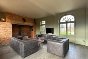 Televiisor ja/või meelelahutuskeskus majutusasutuses La Maison du Château-Confort Premium-Famille-WIFI