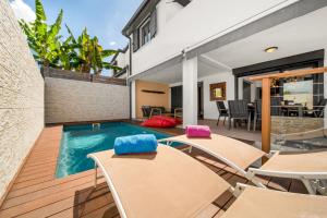 Bazén v ubytování Villa Rêve Austral nebo v jeho okolí