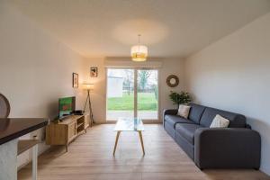 Posezení v ubytování Appartement neuf proche Guingamp